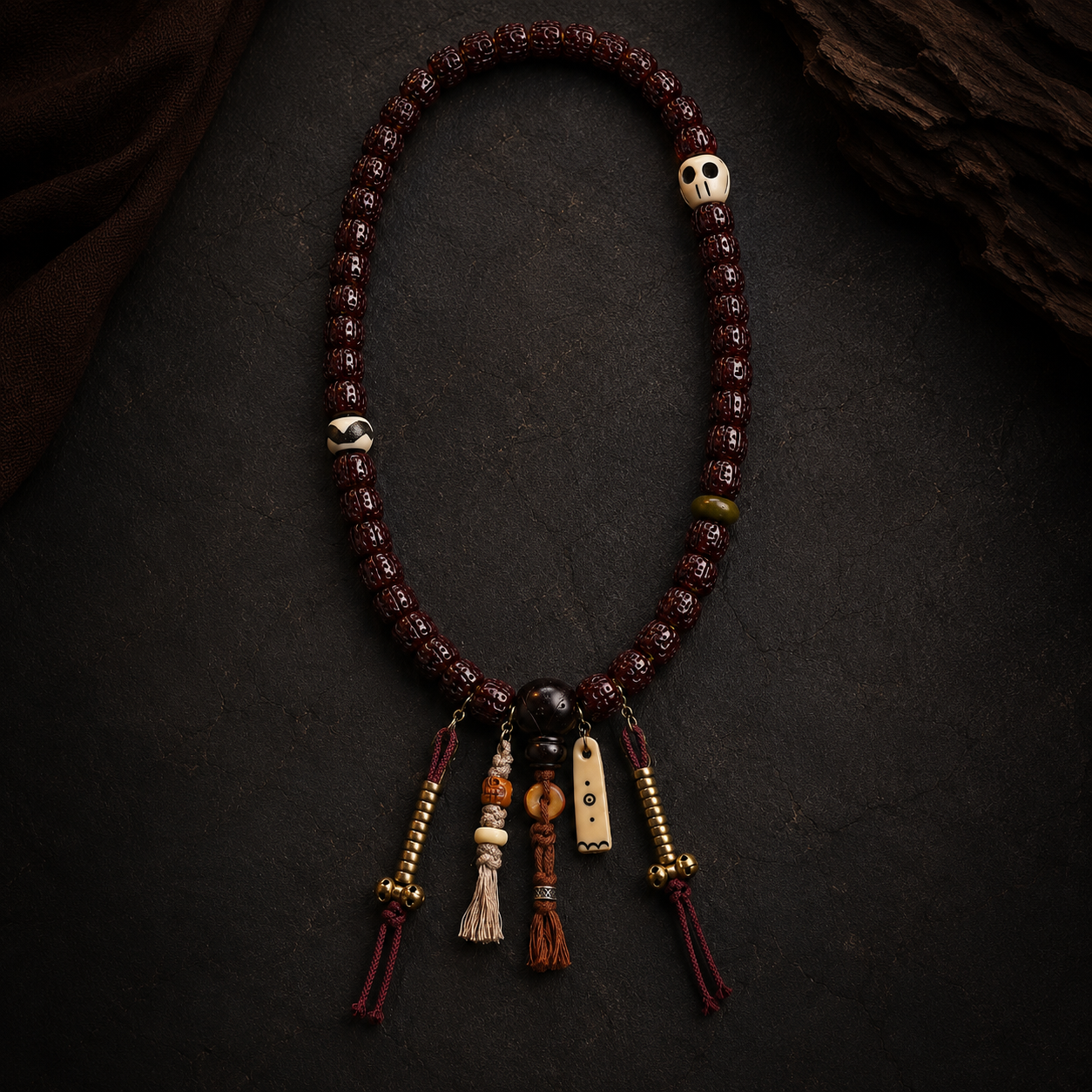 Oxblood Carved Tibetan-Style Mala with Ivory-Tone Amulets - Image 1