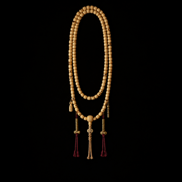 Handcrafted Tibetan Yak Bone Mala Prayer Beads with Aged Brass Charms and Triple Tassels
