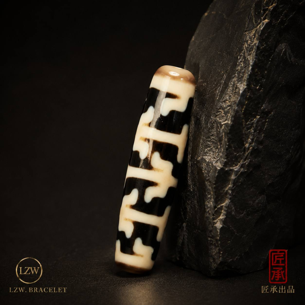 IVORY RITUAL · Black & Cream Patterned Bead