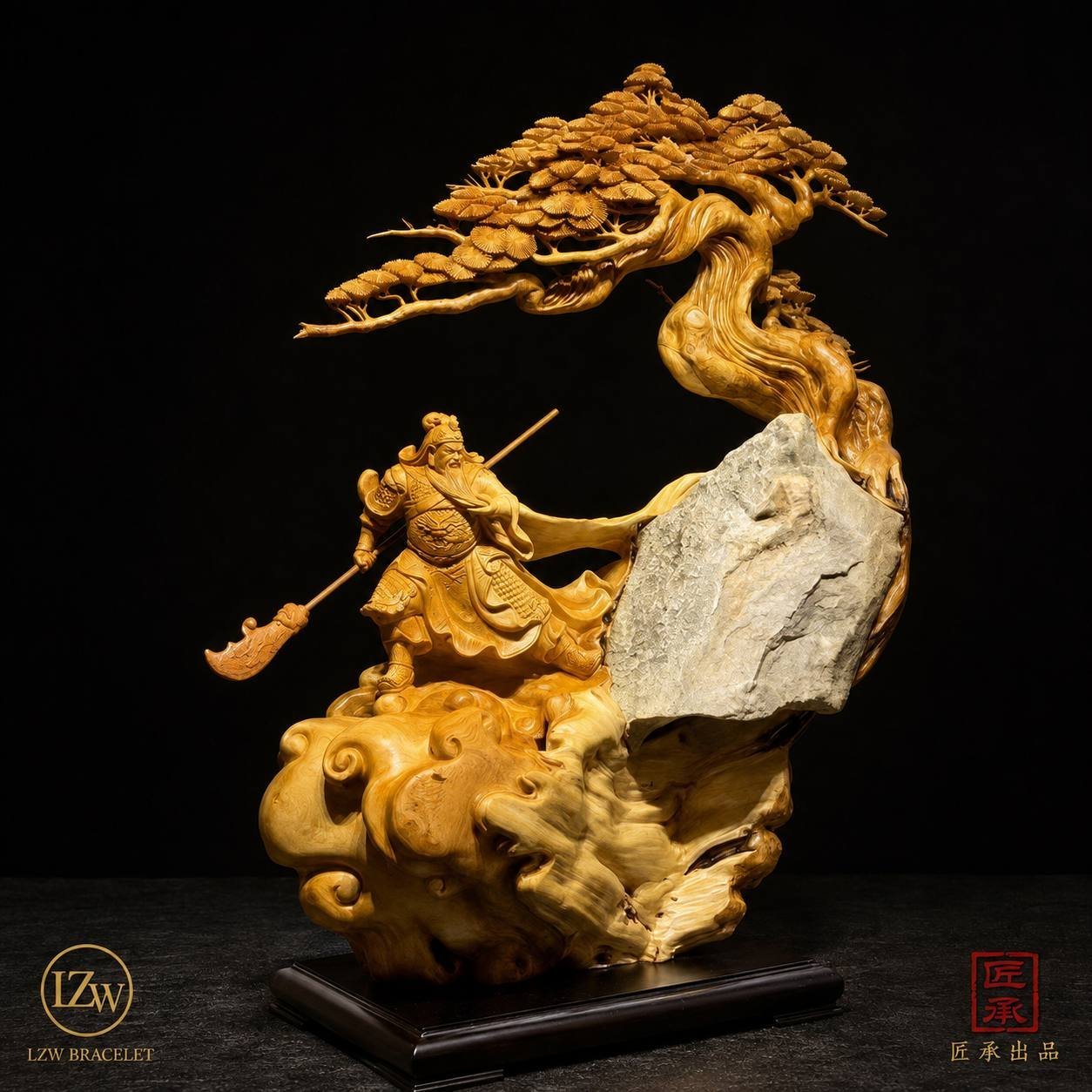 Guan Yu wood sculpture beneath an ancient pine with natural stone