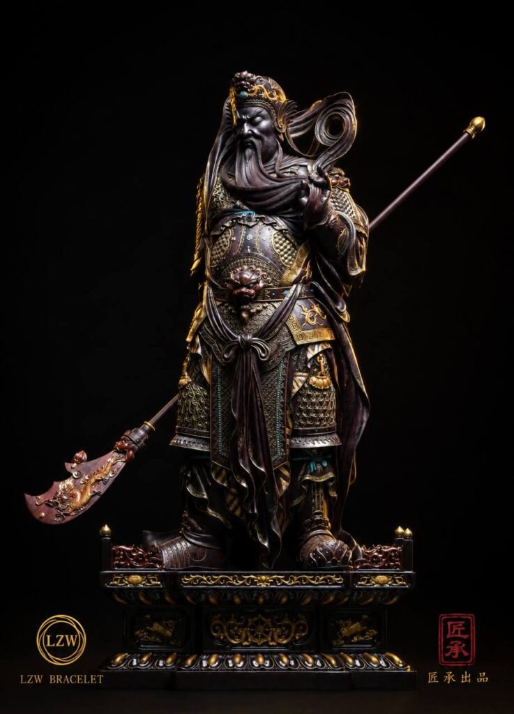 Full view of Guan Yu warrior statue with layered traditional base
