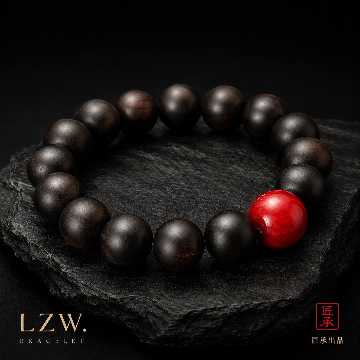 Iron and Crimson wood bead bracelet displayed on a dark stone surface