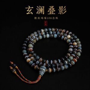 SHADOWED TIDES banded agate 108-bead mala title artwork and product display