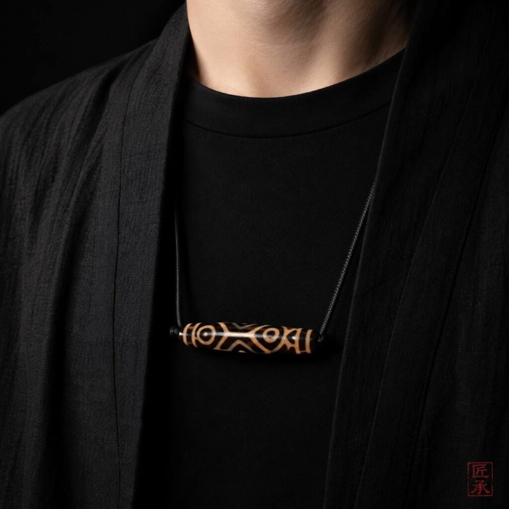 TIBETAN ECHO · Bhutan Double Fish Dzi Bead