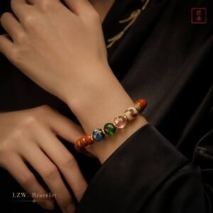 Red Aura bracelet worn on wrist