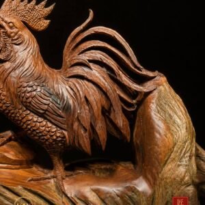 Flowing tail plumage and natural wood grain on rooster sculpture