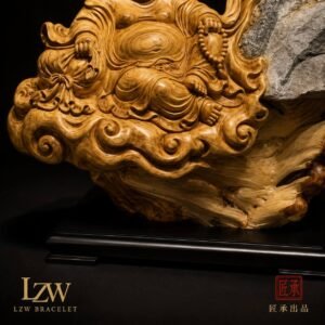 Eastern wood and stone sculpture displayed on a dark base