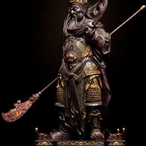Guan Yu statue holding a dragon-bladed weapon