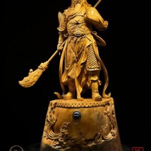 Guan Yu warrior sculpture displayed on a dragon base